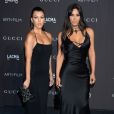 Kourtney Kardashian et sa soeur Kim Kardashian à la soirée LACMA Art + Film en l'honneur de Catherine Opie et Guillermo Del Toro présentée par Gucci à Los Angeles, le 3 novembre 2018