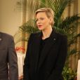 Le prince Albert II de Monaco et la princesse Charlène de Monaco remettent les cadeaux aux personnes âgées au siège de la Croix Rouge, dans le cadre des célébrations de la Fête Nationale monégasque à Monaco, le 17 novembre 2018. © Olivier Huitel/Pool Monaco/Bestimage