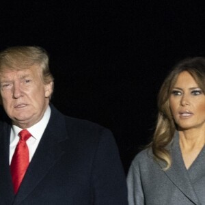 Le président Donald Trump et sa femme la première dame Melania Trump de retour de France arrivent à Washington après avoir célébré le centenaire de l'Armistice du 11 novembre 1918. Washington le 11 novembre 2018.