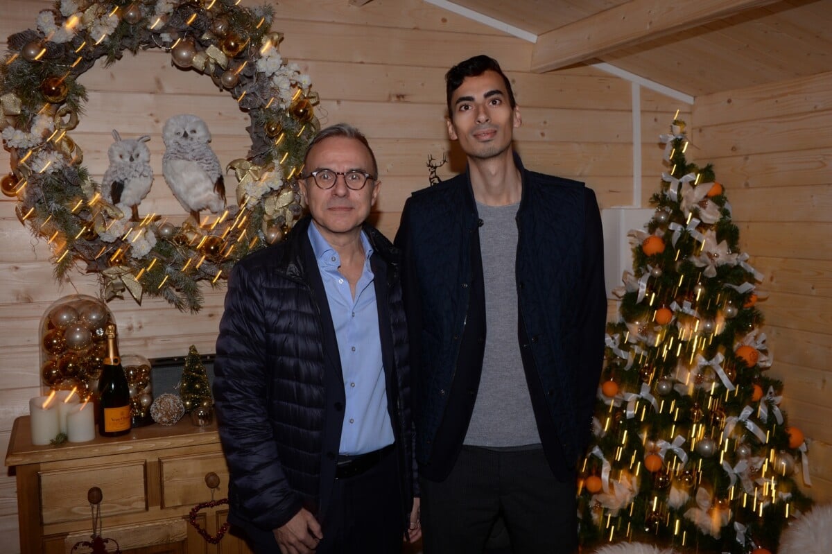 Photo Philippe Besson et son compagnon Sofiane lors de l'inauguration du chalet éphémère 