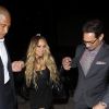 Mariah Carey, escortée de ses deux gardes du corps, à son arrivée au restaurant Craig à West Hollywood. Le 26 septembre 2018.