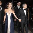 Amal Clooney et George Clooney à la sortie du dîner United Nations Correspondence Association au Cipriani à New York, le 5 décembre 2018.