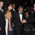 Amal Clooney et George Clooney à la sortie du dîner United Nations Correspondence Association au Cipriani à New York, le 5 décembre 2018.