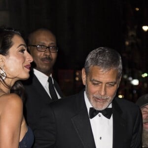 Amal Clooney et George Clooney à la sortie du dîner United Nations Correspondence Association au Cipriani à New York, le 5 décembre 2018.