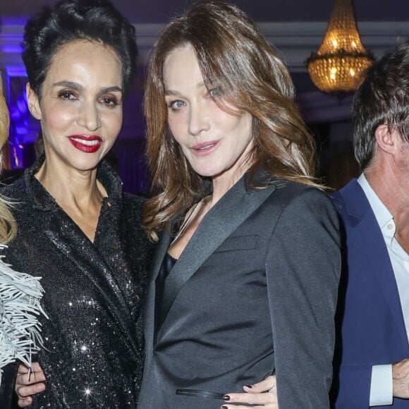 Estelle Lefébure, Farida Khelfa et Carla Bruni-Sarkozy - Dîner de gala de l'association AEM (Un Avenir pour les Enfants du Monde) au bénéfice des enfants du Rwanda organisée par B.Djian au Pavillon Ledoyen à Paris, France, le 11 décembre 2018. © Olivier Borde/Bestimage