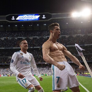 Real Madrid's Cristiano Ronaldo (R) celebrates next to Lucas Vazquez (L) after scoring during a UEFA Champions League quarter final, second leg soccer match between Real Madrid and Juventus at Santiago Bernabeu stadium in Madrid, Spain, April 11, 2018. Photo by RODRIGO JIMENEZ/Efe/ABACAPRESS.COM12/04/2018 - Madrid