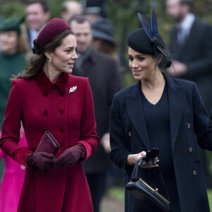 Kate Middleton, la duchesse de Cambridge et Meghan Markle, la duchesse de Sussex enceinte - La famille royale britannique se rend à la messe de Noël à l'église Sainte-Marie-Madeleine à Sandringham, le 25 décembre 2018.