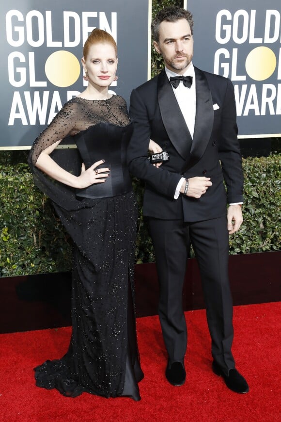 Jessica Chastain et son mari Gian Luca Passi de Preposulo au photocall de la 76ème cérémonie annuelle des Golden Globe Awards au Beverly Hilton Hotel à Los Angeles, Californie, Etats-Unis, le 6 janver 2019.