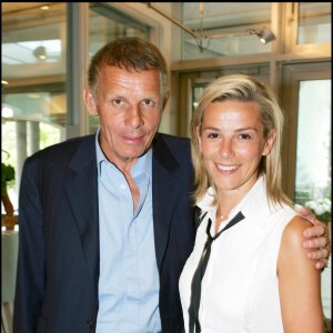 Patrick Poivre d'Arvor et Laurence Ferrari lors du tournoi de tennis de Roland Garros le 1er juin 2005.