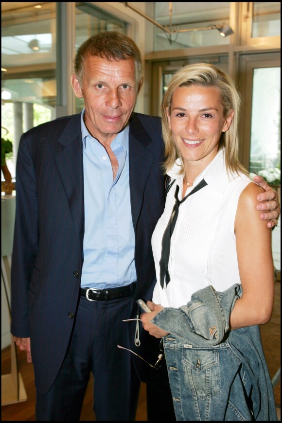 Patrick Poivre d'Arvor et Laurence Ferrari lors du tournoi de tennis de Roland Garros le 1er juin 2005.