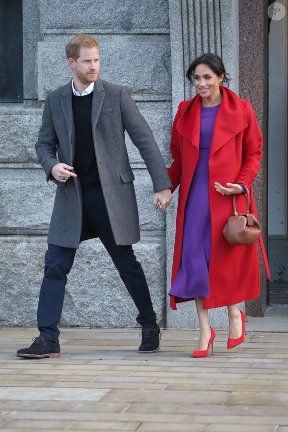 Le prince Harry, duc de Sussex, et Meghan Markle, duchesse de Sussex, enceinte, lors d'une visite à Birkenhead le 14 janvier 2019.