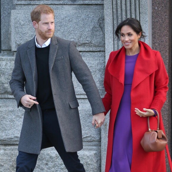 Le prince Harry, duc de Sussex, et Meghan Markle, duchesse de Sussex, enceinte, lors d'une visite à Birkenhead le 14 janvier 2019.