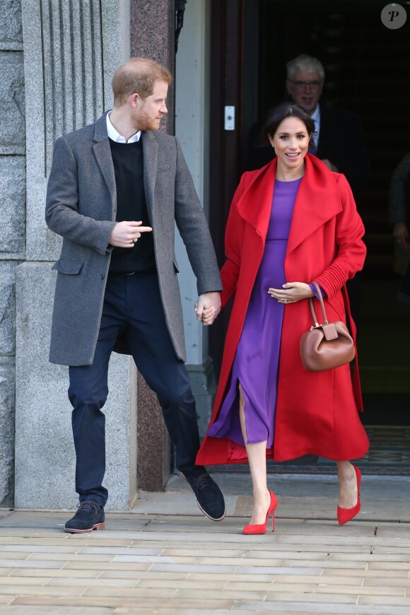 Le prince Harry, duc de Sussex, et Meghan Markle, duchesse de Sussex, enceinte, lors d'une visite à Birkenhead le 14 janvier 2019.
