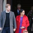 Le prince Harry, duc de Sussex, et Meghan Markle, duchesse de Sussex, enceinte, lors d'une visite à Birkenhead le 14 janvier 2019.