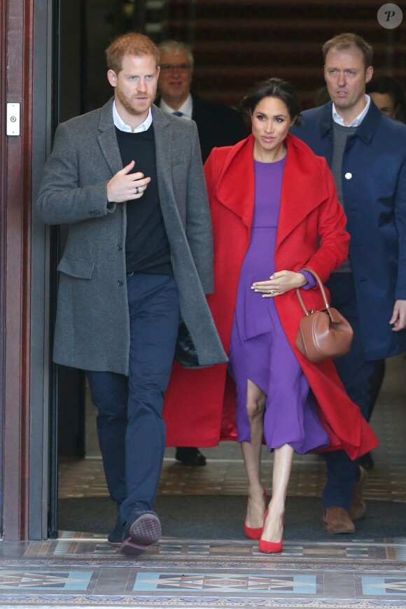 Le prince Harry, duc de Sussex, et Meghan Markle, duchesse de Sussex, enceinte, lors d'une visite à Birkenhead le 14 janvier 2019.