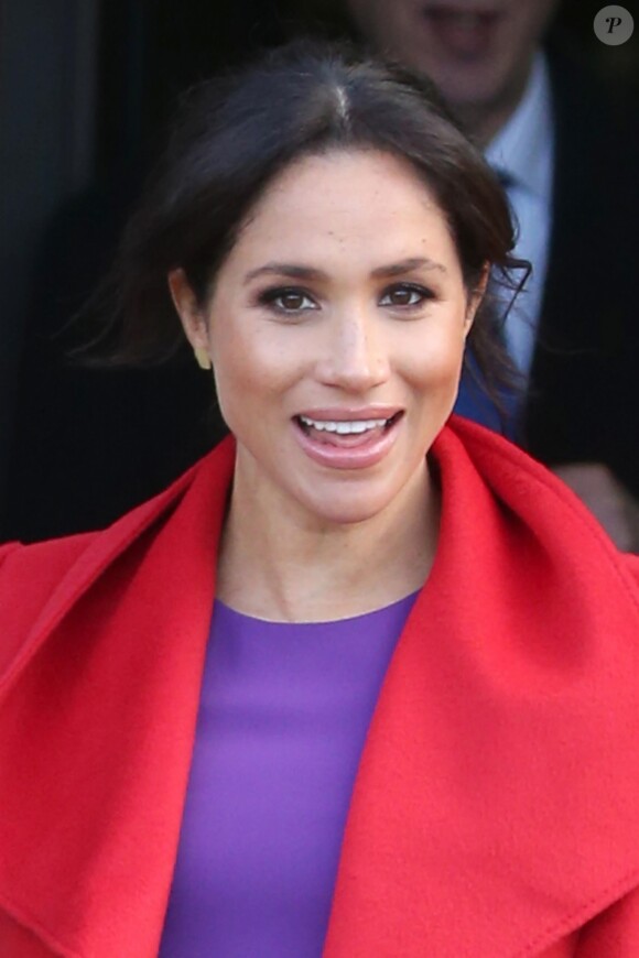Le prince Harry, duc de Sussex, et Meghan Markle, duchesse de Sussex, enceinte, lors d'une visite à Birkenhead le 14 janvier 2019.