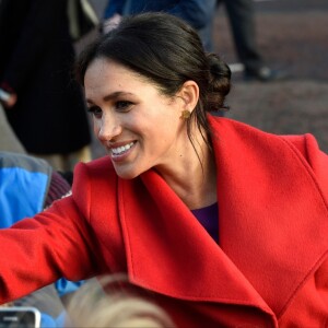 Le prince Harry, duc de Sussex, et Meghan Markle, duchesse de Sussex, enceinte, lors d'une visite à Birkenhead le 14 janvier 2019.