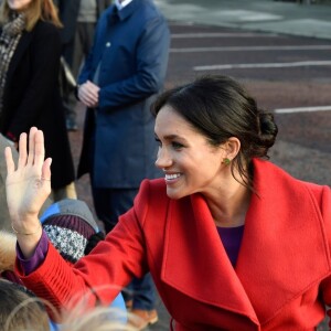 Le prince Harry, duc de Sussex, et Meghan Markle, duchesse de Sussex, enceinte, lors d'une visite à Birkenhead le 14 janvier 2019.