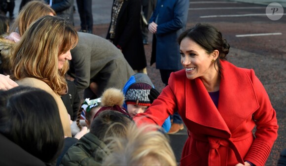 Le prince Harry, duc de Sussex, et Meghan Markle, duchesse de Sussex, enceinte, lors d'une visite à Birkenhead le 14 janvier 2019.