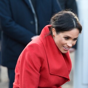 Le prince Harry, duc de Sussex, et Meghan Markle, duchesse de Sussex, enceinte, lors d'une visite à Birkenhead le 14 janvier 2019.