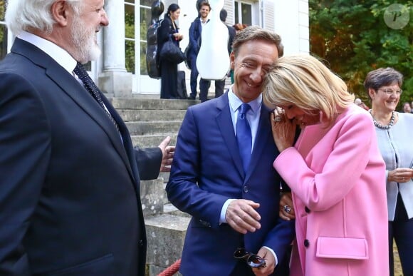 Stéphane Bern, responsable de la mission patrimoine, et la première dame Brigitte Macron - Le président de la République française et sa femme visitent la villa Viardot à l'occasion des Journées Européennes du Patrimoine à Bougival, le 15 septembre 2018. © Stéphane Lemouton/Bestimage