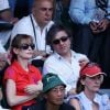 Isabelle Huppert et son mari Ronald Chammah lors du tournoi de tennis de Roland Garros à Paris, le 5 juin 2010.