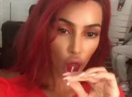 Kim Kardashian : Cheveux rouges et combi en latex, une transformation torride !
