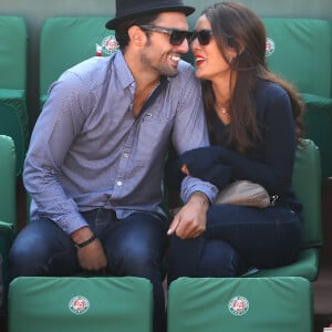 Sofia Essaïdi et son compagnon Adrien Galo dans les tribunes de Roland Garros lors de la Coupe Davis, le 12 septembre 2014 à Paris.