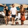 Le DJ David Guetta et le DJ Cédric Gervais accompagnés de leur girlfriend respective sur une plage à Miami, le 09 mars 2019.