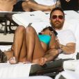 Le DJ David Guetta et Jessica Ledon sur une plage à Miami, le 09 mars 2019.