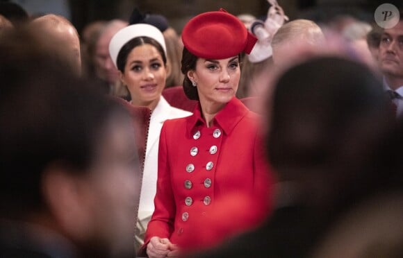 Catherine Kate Middleton, duchesse de Cambridge, Meghan Markle, enceinte, duchesse de Sussex lors de la messe en l'honneur de la journée du Commonwealth à l'abbaye de Westminster à Londres le 11 mars 2019.