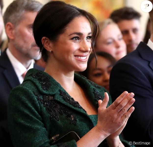 Meghan Markle, enceinte, duchesse de Sussex, lors de sa visite à Canada House dans le cadre d'une cérémonie pour la Journée du Commonwealth à Londres le 11 mars 2019.