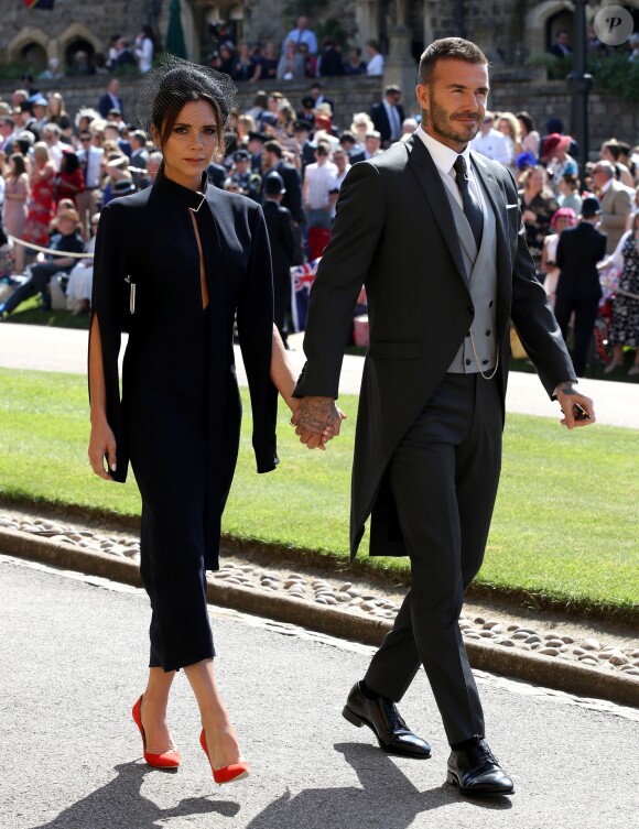 David Beckham et sa femme Victoria - Les invités arrivent à la chapelle St. George pour le mariage du prince Harry et de Meghan Markle au château de Windsor, Royaume Uni, le 19 mai 2018.