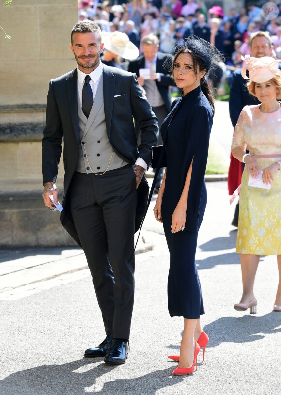 David Beckham et sa femme Victoria - Les invités arrivent à la chapelle St. George pour le mariage du prince Harry et de Meghan Markle au château de Windsor, Royaume Uni, le 19 mai 2018.