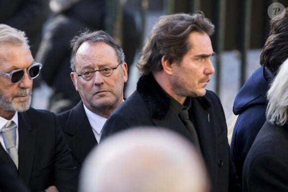 Jean Reno et Sébastien Farran - Arrivées des personnalités en l'église de La Madeleine pour les obsèques de Johnny Hallyday à Paris. Le 9 décembre 2017