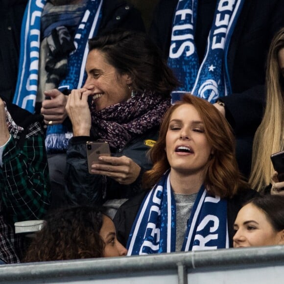 Alessandra Sublet et un ami, Bertrand Chameroy, Maëva Coucke (Miss France 2018) - People assistent au match des éliminatoires de l'Euro 2020 entre la France et l'Islande au Stade de France à Saint-Denis le 25 mars 2019. La france a remporté le match sur le score de 4-0.