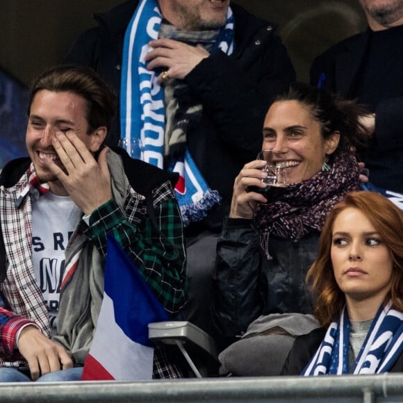 Alessandra Sublet et un ami, Maëva Coucke (Miss France 2018) - People assistent au match des éliminatoires de l'Euro 2020 entre la France et l'Islande au Stade de France à Saint-Denis le 25 mars 2019. La france a remporté le match sur le score de 4-0.