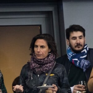 Alessandra Sublet et un ami, Bertrand Chameroy - People assistent au match des éliminatoires de l'Euro 2020 entre la France et l'Islande au Stade de France à Saint-Denis le 25 mars 2019. La france a remporté le match sur le score de 4-0.