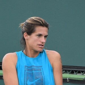 Amélie Mauresmo à l'entraînement avec Lucas Pouille lors du tournoir d'Indian Wells, le 5 mars 2019.