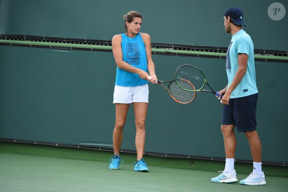 Amélie Mauresmo à l'entraînement avec Lucas Pouille lors du tournoir d'Indian Wells, le 5 mars 2019.