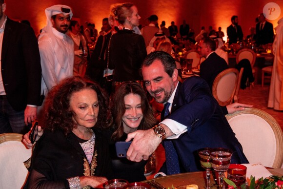 Diane von Furstenberg, Carla Bruni-Sarkozy et le prince Nikolaos de Grèce - Soirée d'inauguration du Musée National du Qatar. Doha, le 27 mars 2019.