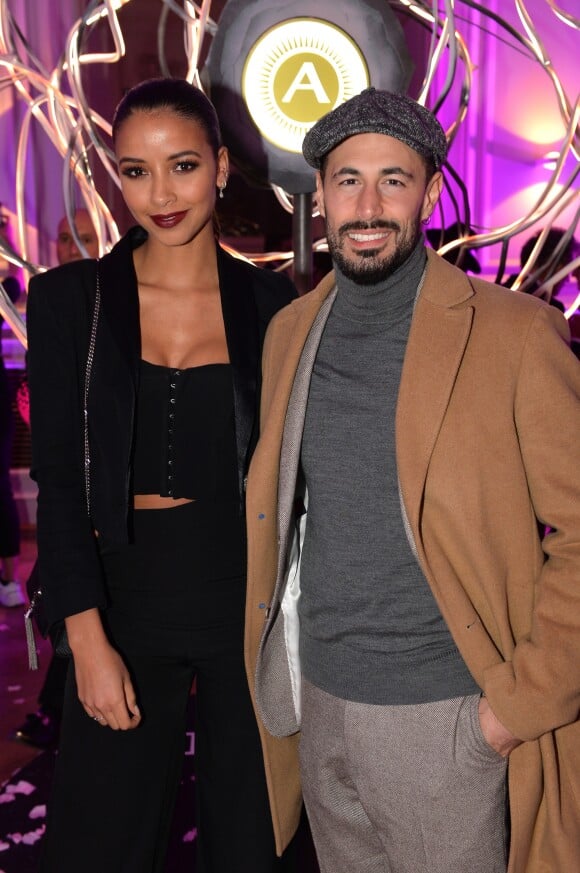 Flora Coquerel et son compagnon Ugo Ciulla à la soirée de présentation du nouveau parfum "Wanted Girl" d'Azzaro à l'hôtel Salomon de Rothschild à Paris, le 29 mars 2019. En 2016, la maison Azzaro entamait une nouvelle ère avec le parfum Azzaro Wanted. À l'image du couturier, Azzaro Wanted incarne l'élégance et la flamboyance comme style de vie. Être Wanted, c'est susciter le désir et l'envie autour de soi. ©Veeren/Bestimage