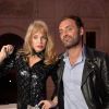 Arielle Dombasle et Augustin Trapenard à la soirée de présentation du nouveau parfum "Wanted Girl" d'Azzaro à l'hôtel Salomon de Rothschild à Paris, le 29 mars 2019. En 2016, la maison Azzaro entamait une nouvelle ère avec le parfum Azzaro Wanted. À l'image du couturier, Azzaro Wanted incarne l'élégance et la flamboyance comme style de vie. Être Wanted, c'est susciter le désir et l'envie autour de soi. ©Veeren/Bestimage