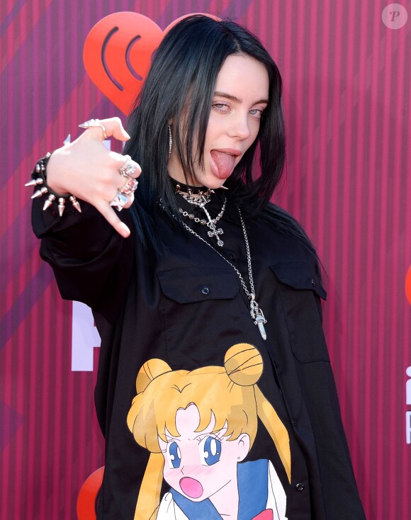 Billie Eilish au photocall des "2019 iHeart Radio Music Awards" au Microsoft Theatre à Los Angeles, le 14 mars 2019.