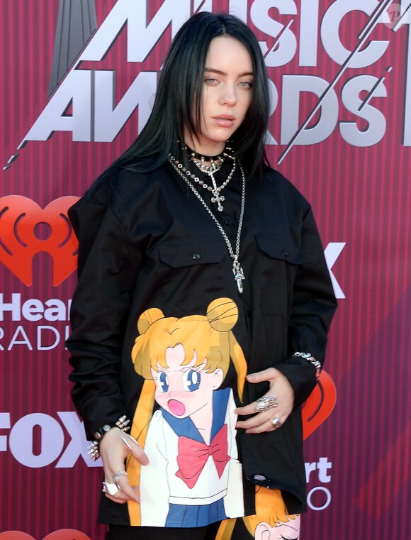 Billie Eilish au photocall des "2019 iHeart Radio Music Awards" au Microsoft Theatre à Los Angeles, le 14 mars 2019.