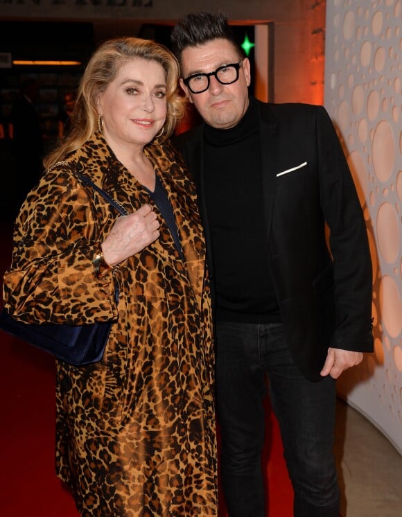 Catherine Deneuve et Laurent Guyot - Soirée de lancement du Best-Seller "Le retour du jeune prince" d'A.G. Roemmers à l'Atelier des Lumières à Paris, France, le 10 avril 2019.© Veeren/Bestimage