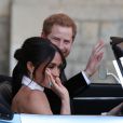 Le prince Harry, duc de Sussex, et Meghan Markle, duchesse de Sussex, habillée d'une robe Stella McCartney et portant une bague sertie d'une aigue-marine ayant appartenu à Lady Diana, ont quitté le château de Windsor après la réception offerte par Elizabeth II pour rejoindre à bord d'une Jaguar E-Type Concept Zero immatriculée "190518" Frogmore House où avait lieu la réception de leur mariage, le 19 mai 2018.
