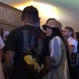 Exclusif - Kylie Jenner et son compagnon Travis Scott se rendent au festival Coachella, Kylie porte un bob beige et un ensemble en jean tye and dye. Indio, le 13 avril 2019.