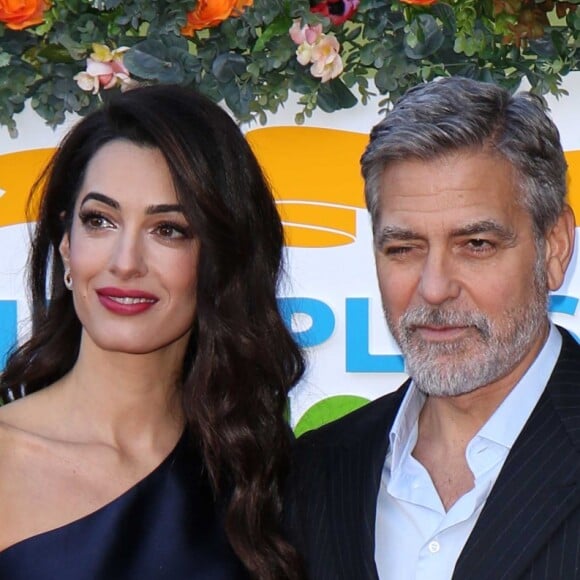 George Clooney et sa femme Amal arrivent à l'événement "Postcode Lottery Charity Gala" au McEwan hall à Edimbourg le 14 mars 2019.
