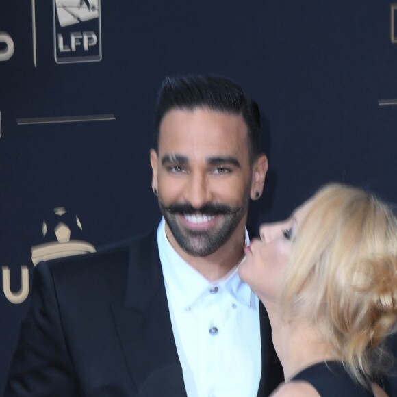 Adil Rami et sa compagne Pamela Anderson au photocall de la 28ème cérémonie des trophées UNFP (Union nationale des footballeurs professionnels) au Pavillon d'Armenonville à Paris, France, le 19 mai 2019. © Coadic Guirec/Bestimage